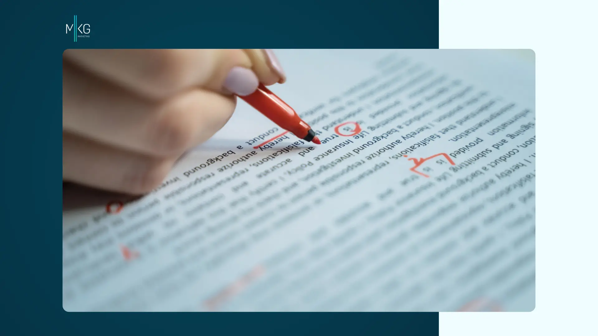 Overhead view of a page of text with a hand holding a red pen making edits.